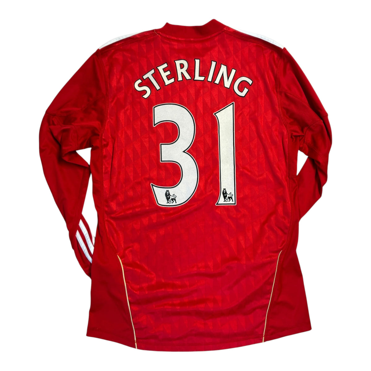 Liverpool 2010/12 pelipaita, Sterling #31
