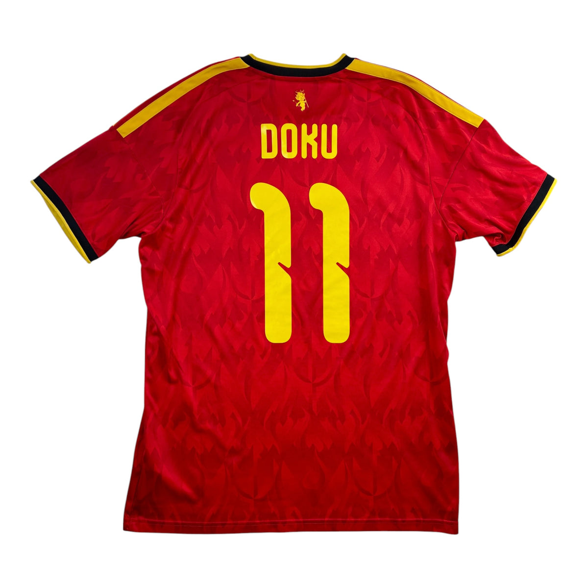 Belgia 2026 kotipaita, Doku #11